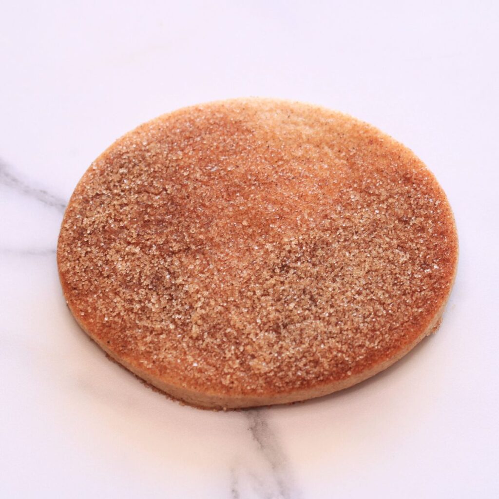 A blank oval cookie.
